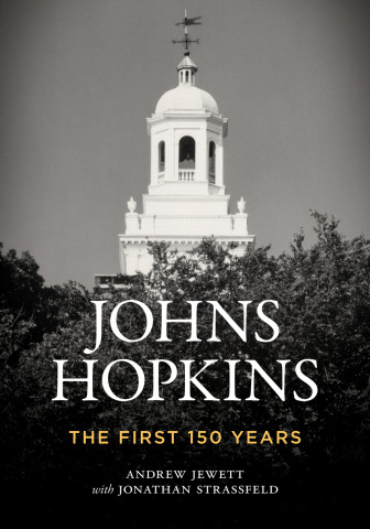 Cover of "Johns Hopkins: The First 150 Years" by Andrew Jewett with Jonathan Strassfeld, featuring an archival photo of a domed campus building rising above trees.