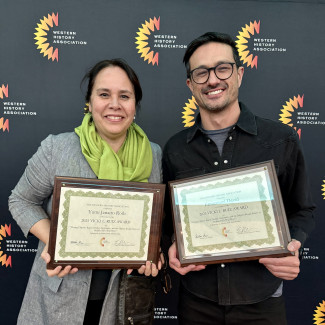 Yumi Roth and Emmanuel David accept the Vicki L. Ruiz Award at the 2025 Western History Association Conference