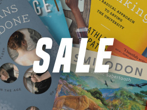 Book covers with Sale on top of it.